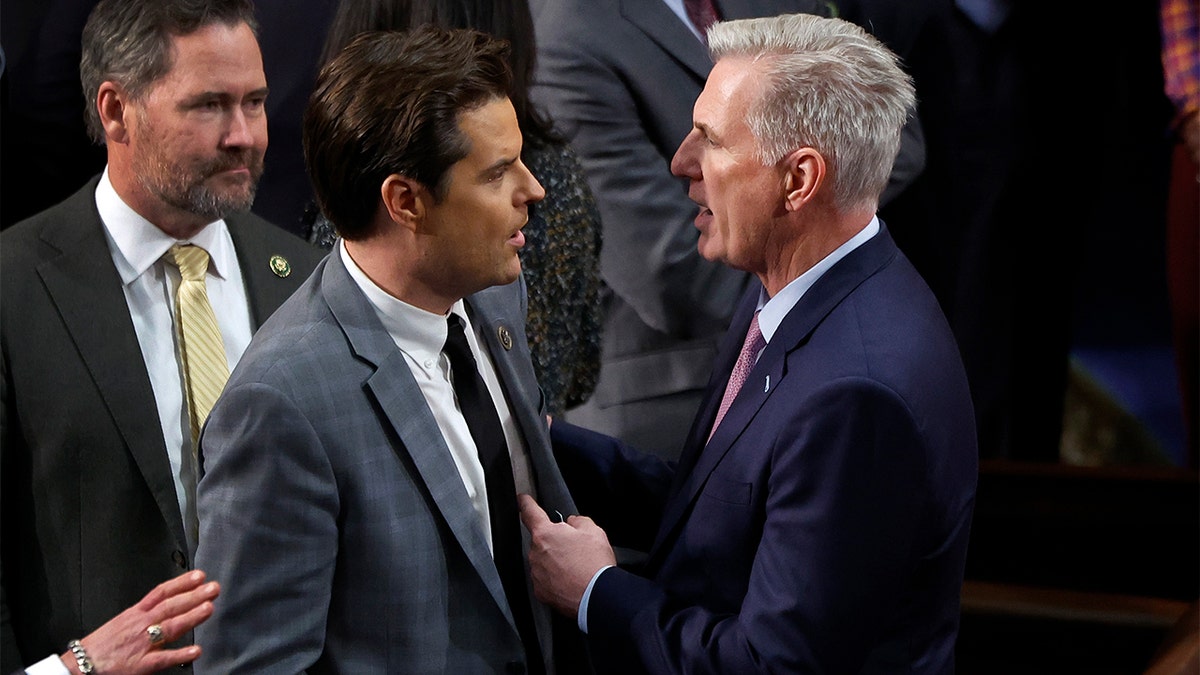 McCarthy speaking with Gaetzv in the Capitol building.