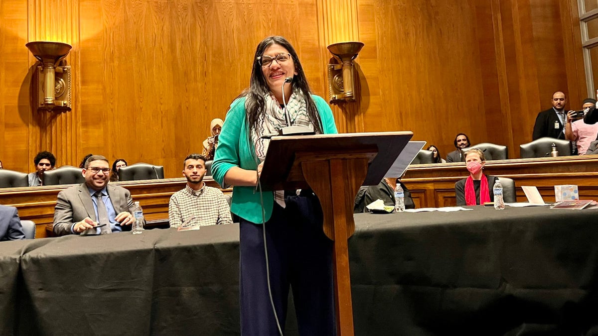 Rashida Tlaib speaks at podium