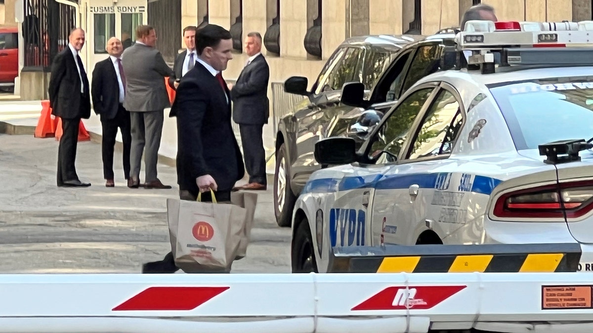 Staffer carries McDonald's to Manhattan court house