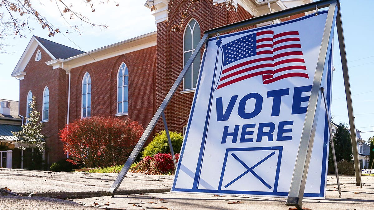 Vote here sign