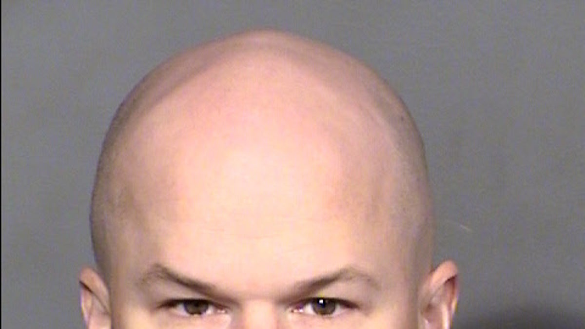 Las Vegas police booked Sam Brinton at a detention center on Wednesday.