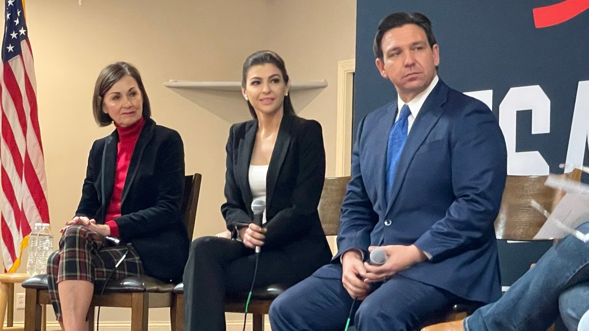 Kim Reynolds, Casey DeSantis, Ron DeSantis on stage