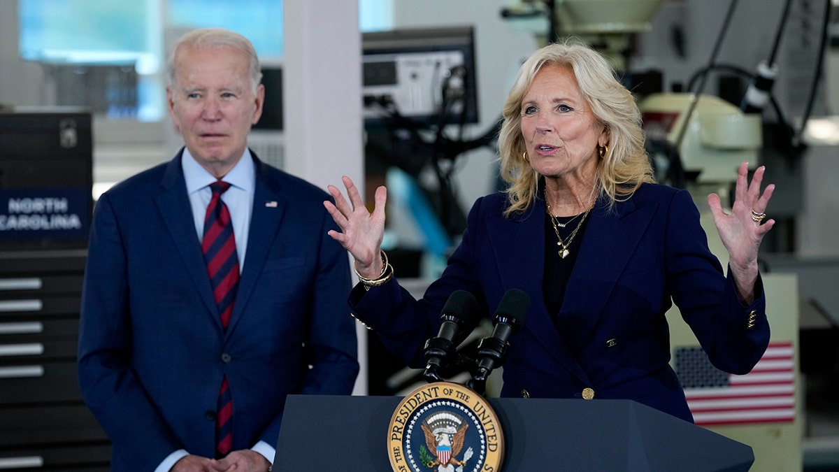 Joe and Jill Biden speak at podium