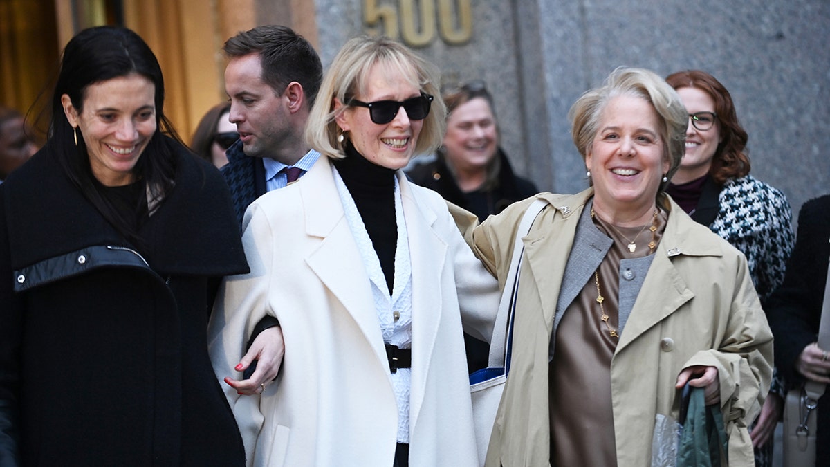 E. Jean Carroll exits court building with attorneys after winning $83 million judgement against Donald Trump