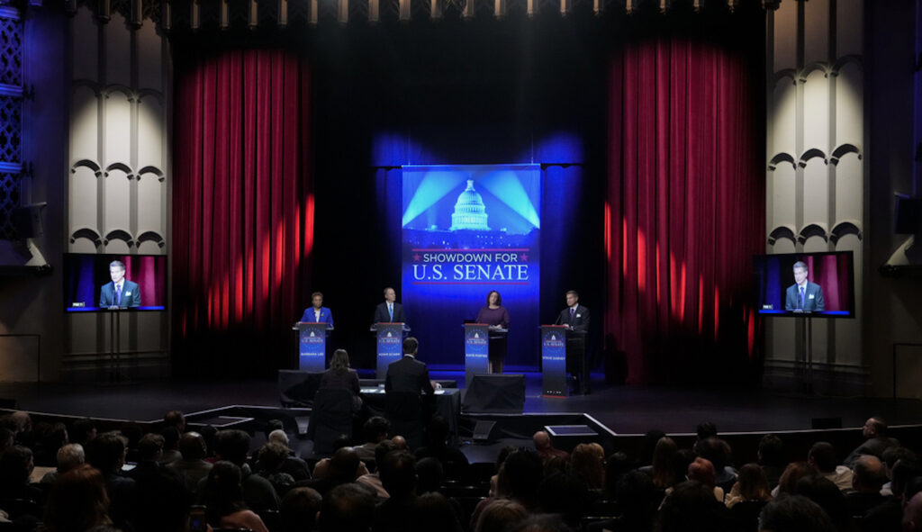 From left, Rep. Barbara Lee (D-CA), Rep. Adam Schiff (D-CA), Rep. Katie Porter (D-CA), and Steve Garvey on stage during a televised debate for the California Senate race, Monday, Jan. 22, 2024, in Los Angeles. (AP Photo/Damian Dovarganes)