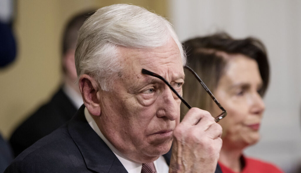 Minority Whip Steny Hoyer, D-Md., joined at right by House Minority Leader Nancy Pelosi, D-Calif., appear before a committee on Capitol Hill in D.C.