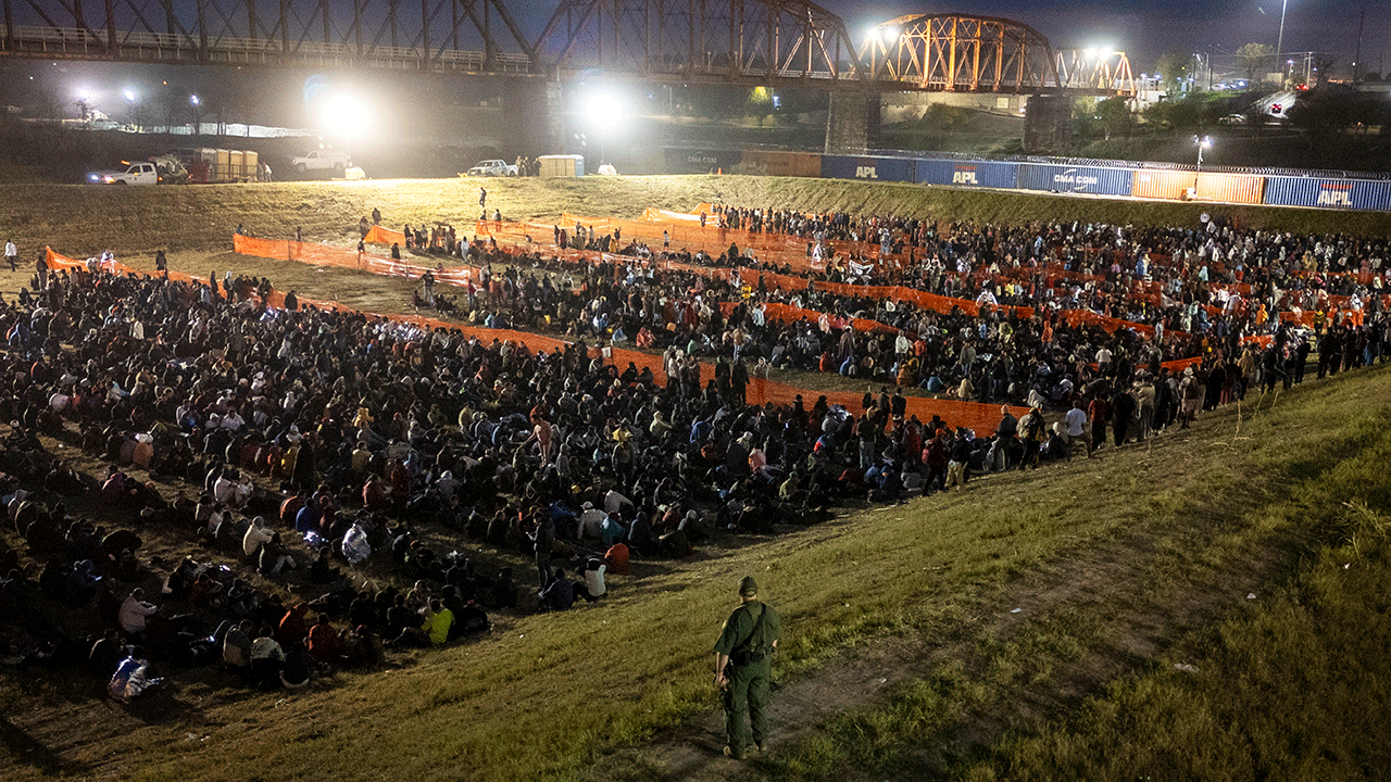 Migrants crossing into Texas along southern border