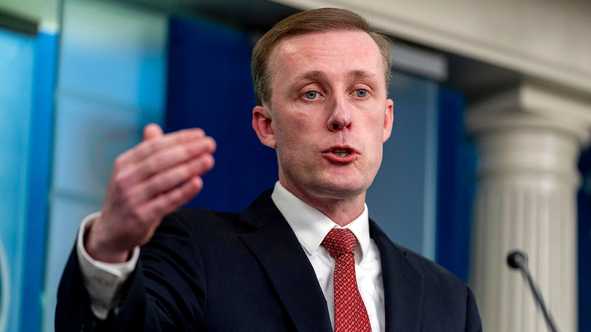 Jake Sullivan gesturing from lectern in briefing room