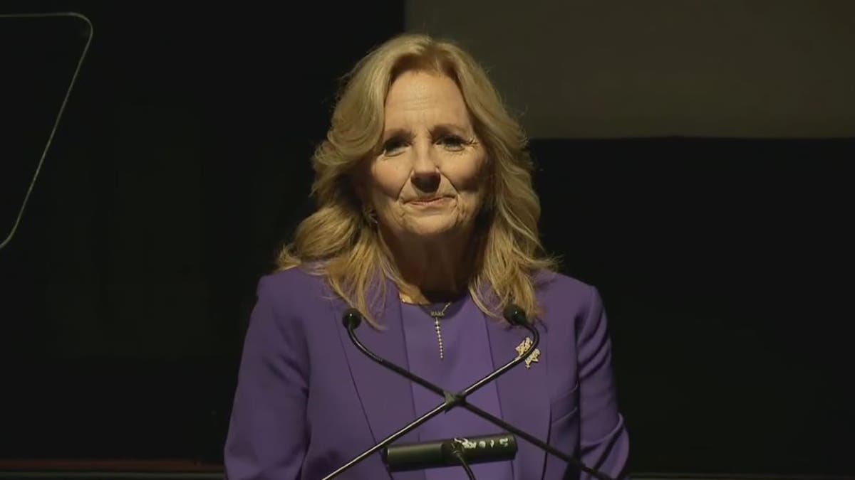 Jill Biden standing at podium