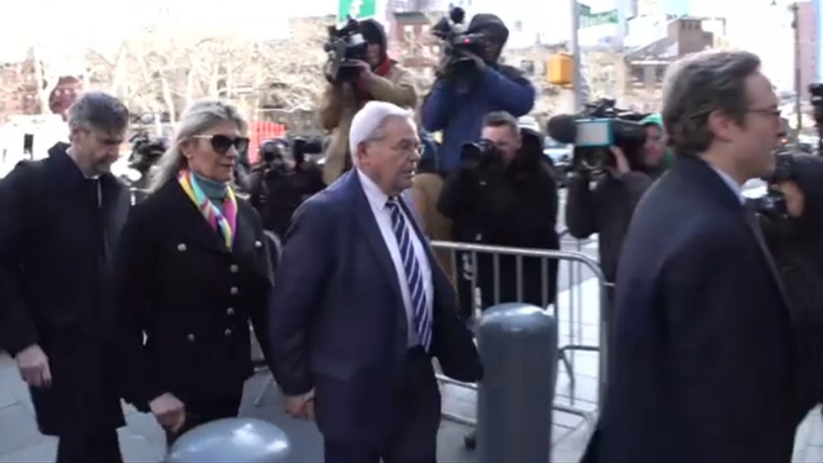 Menendez walks into court