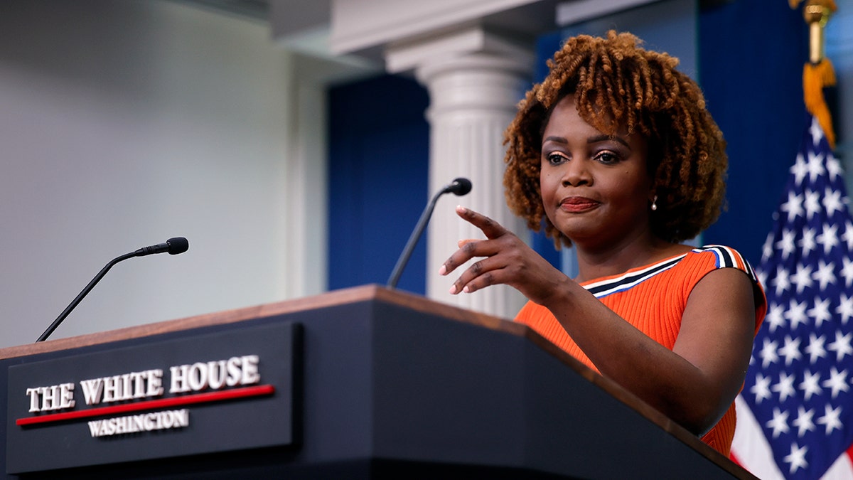 Karine Jean-Pierre speaks at podium