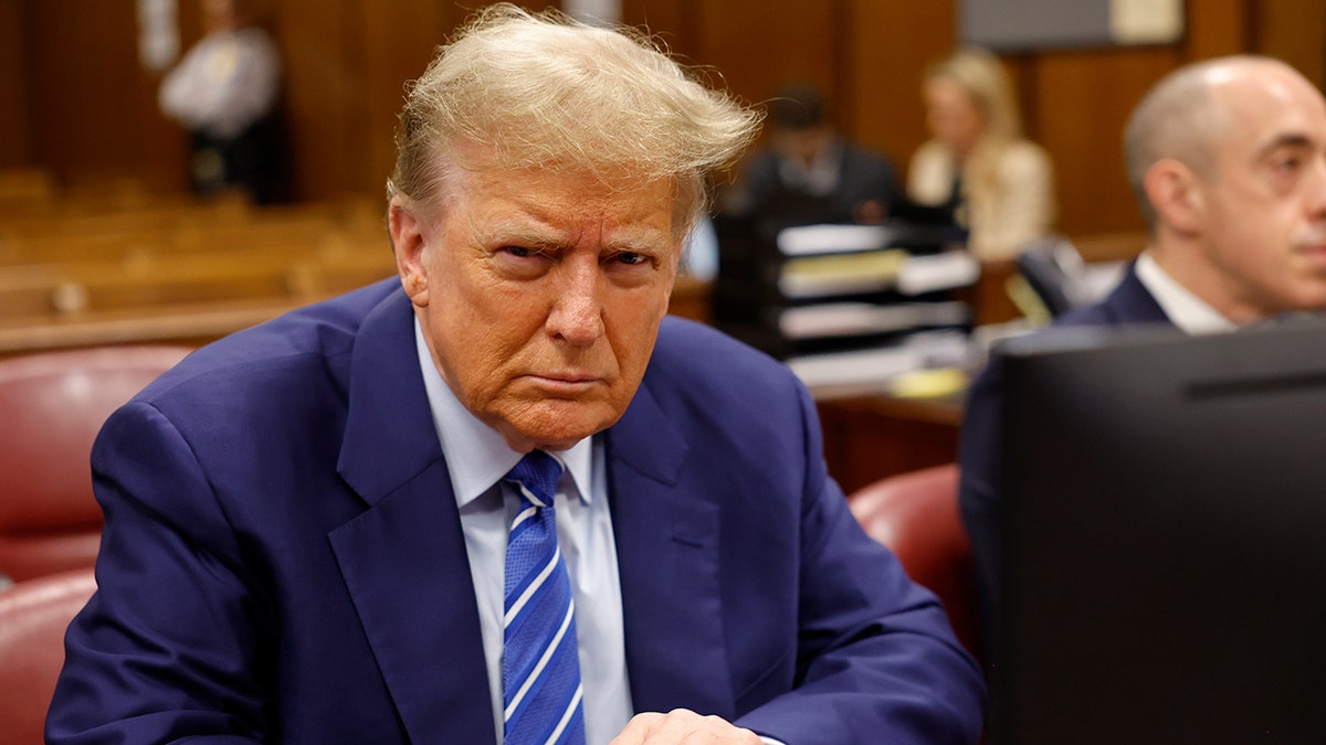 Trump looks into the camera during court proceedings in New York
