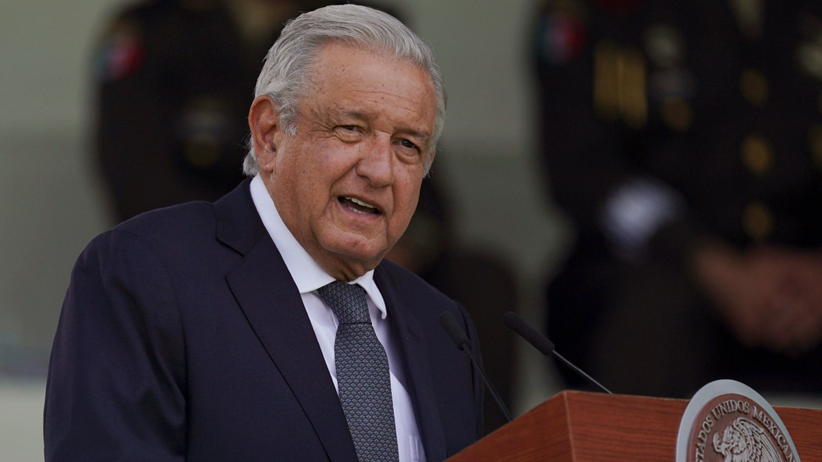 Mexico's president Lopez Obrador speaking at podium