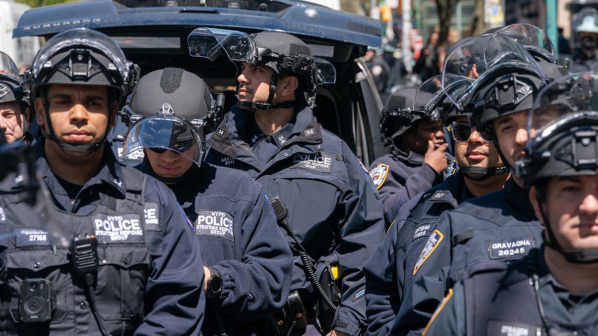 cops in riot gear arrive at Columbia University