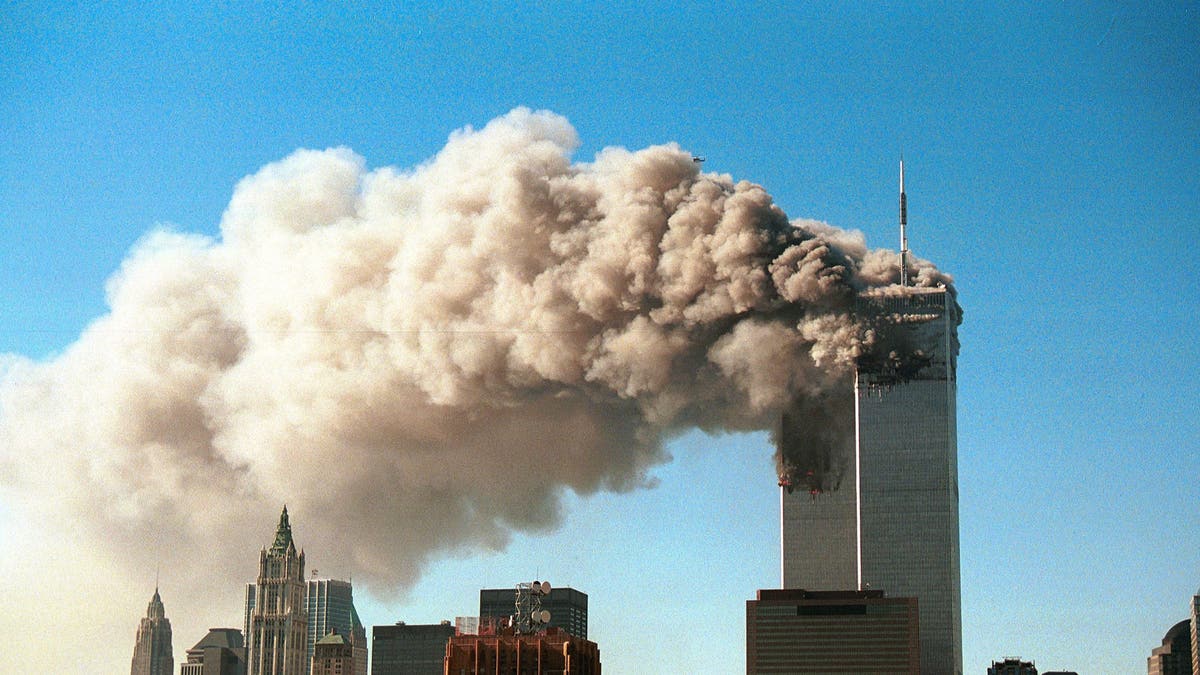 Smoke pours from the twin towers of the World Trade Center on Sept. 11, 2001, in New York City.