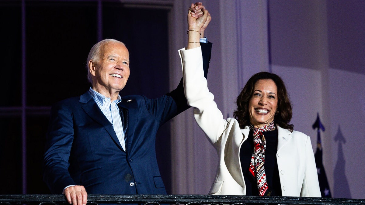 President Biden and Vice President Harris are shown on the Truman Balcony at the White House on July 4, 2024.