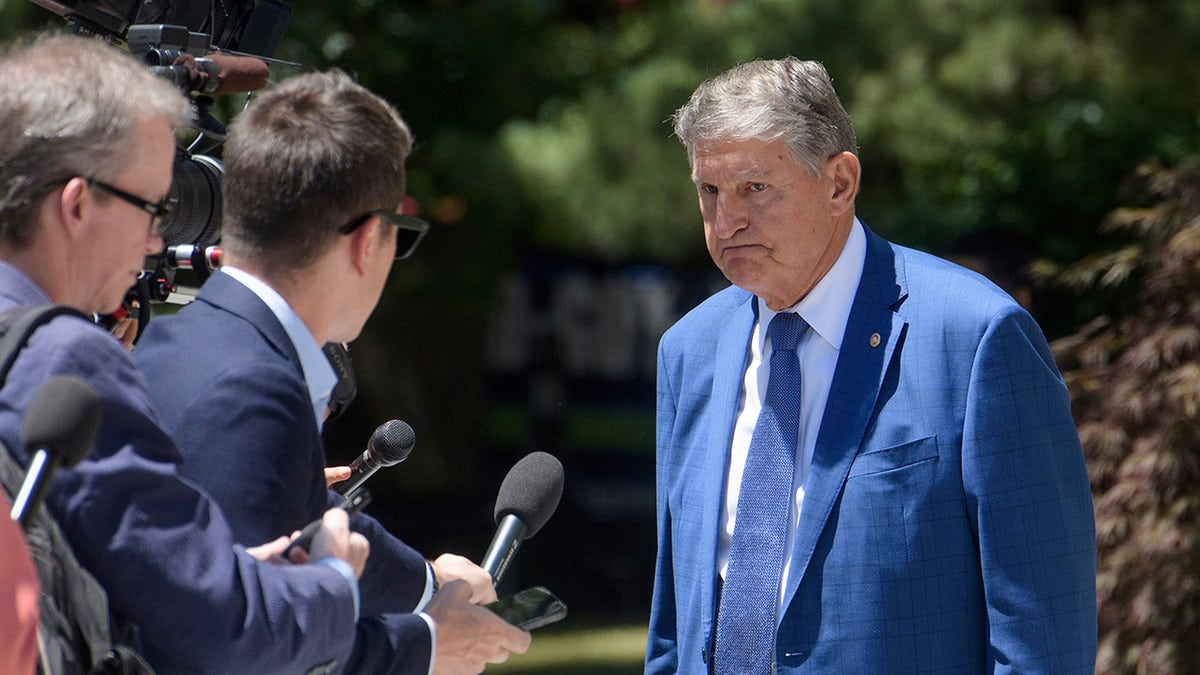 Manchin talks to reporters