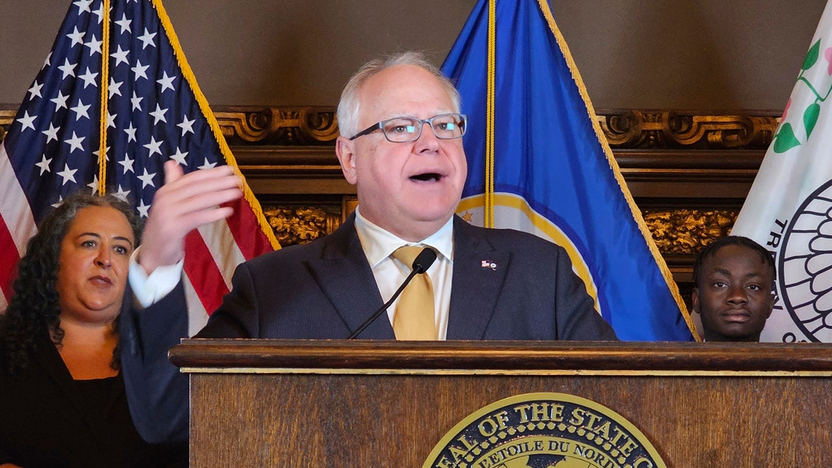 Democratic Gov. Tim Walz at podium