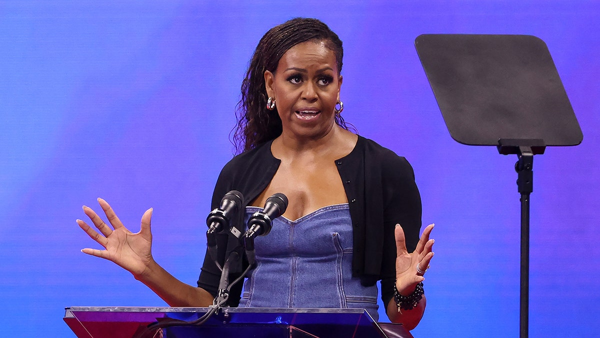 Michelle Obama speaking at podium