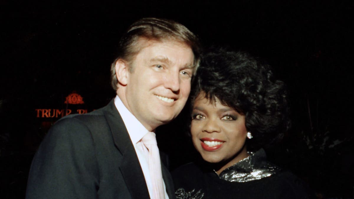 Donald Trump and Oprah Winfrey at Tyson vs Holmes Convention Hall in Atlantic City, New Jersey.