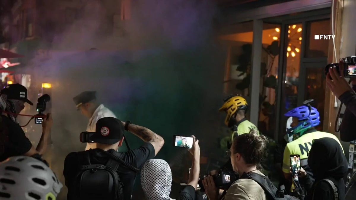 Protesters outside Harris event in Harlem, New York City