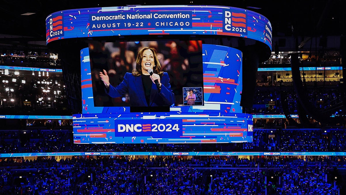 Democratic presidential nominee and U.S. Vice President Kamala Harris is shown on a screen as she speaks from a Milwaukee rally