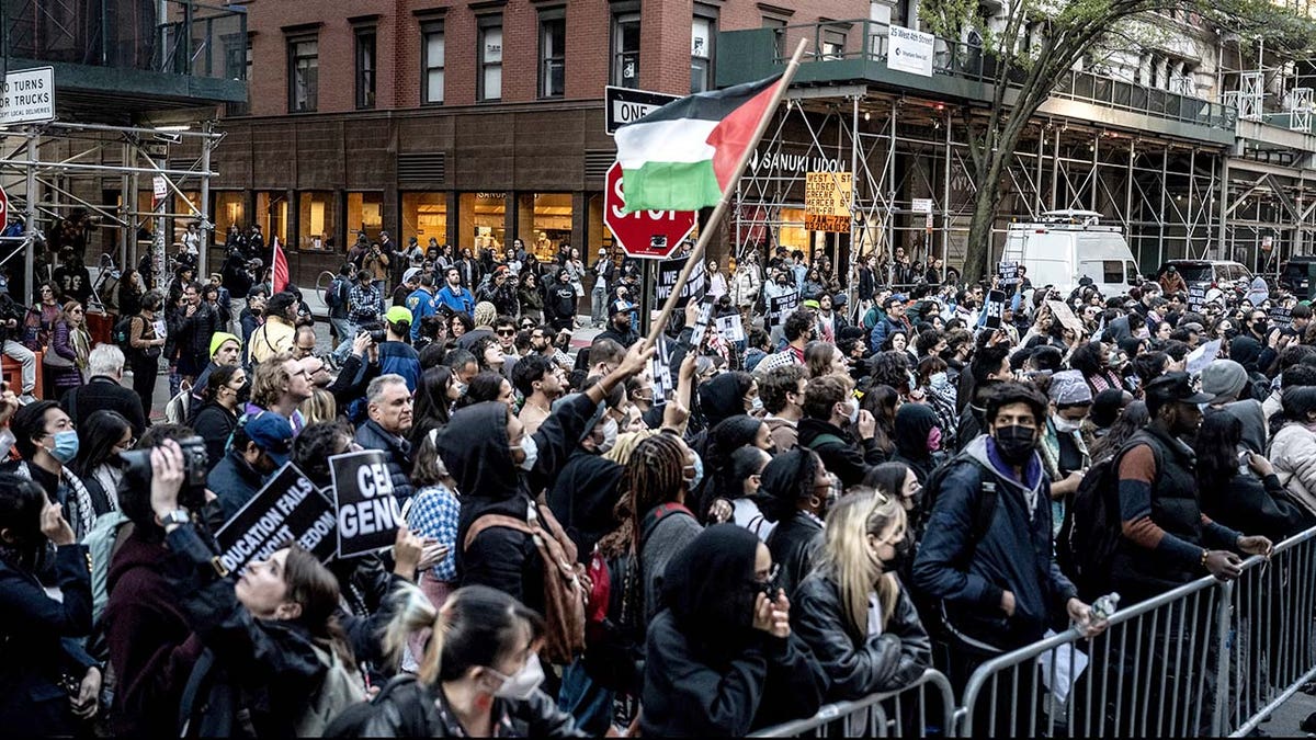 Anti-Israel demonstrators outside the Stern School of Business at New York University in the Greenwich Village neighborhood of New York City on Monday, April 22, 2024.