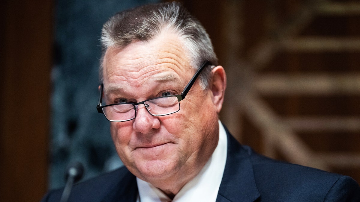 Sen. Jon Tester arrives for the Senate Appropriations Subcommittee on Defense hearing on Capitol Hill, June 18, 2024.