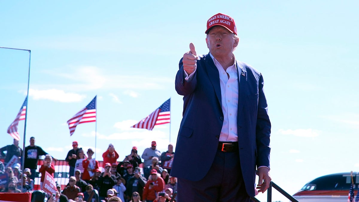 Trump giving thumbs-up at rally 