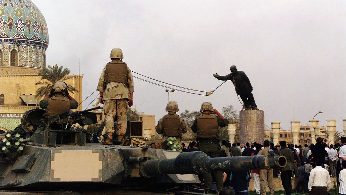 Saddam Hussein statue.