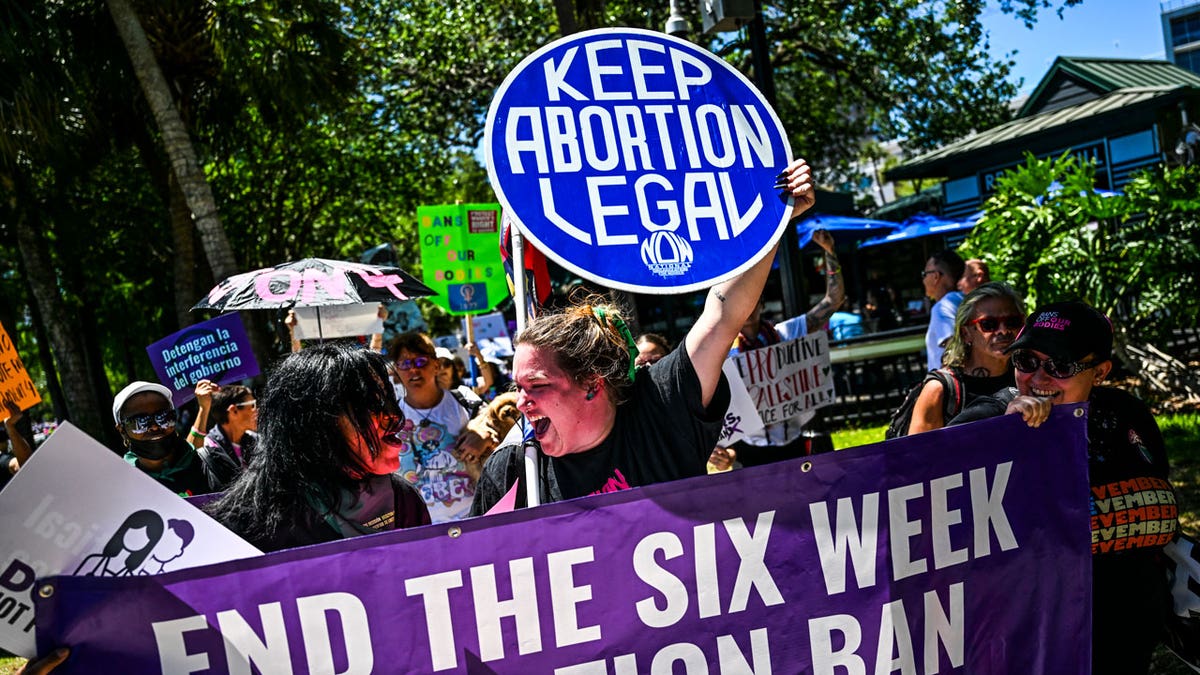 Pro-abortion rights activists in Florida participate conduct a rally to protect abortion rights for Floridians. 