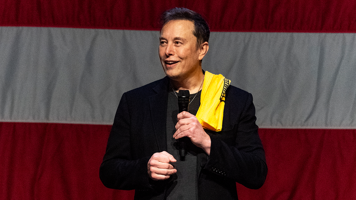 Elon Musk speaking at an event