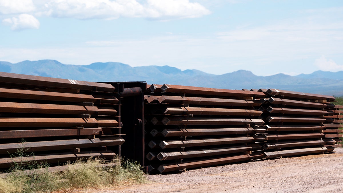 Border fence construction materials sit unused on the U.S.-Mexico border south of Sierra Vista, Arizona, on Aug. 22.