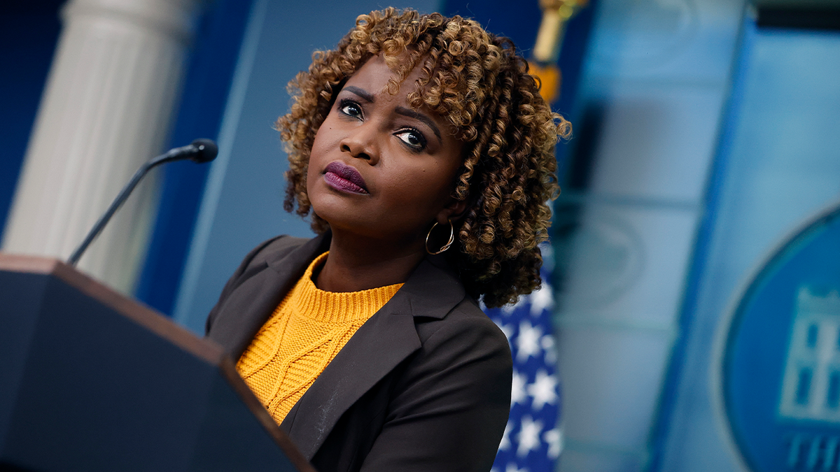 karine jean-pierre wearing a yellow sweater