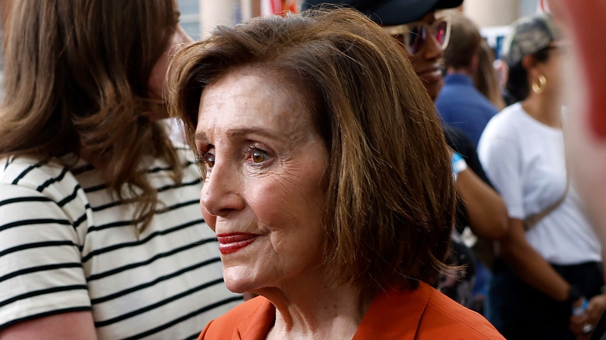 Pelosi grimacing