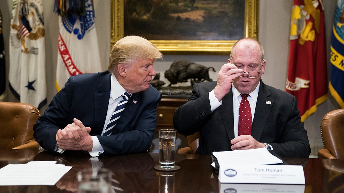 President Trump and acting director of Immigration and Customs Enforcement Thomas Homan