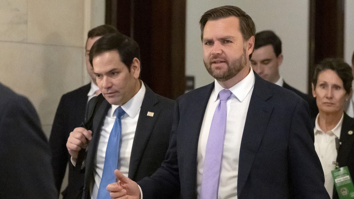 Vance walks with Rubio in between meeting with senators