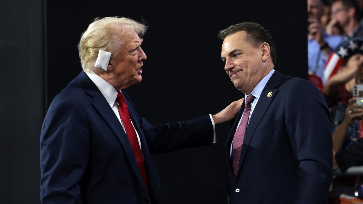 Now-President-elect Donald Trump greets Rep. Richard Hudson of North Carolina, the chair of the National Republican Congressional Committee (NRCC), on the fourth day of the Republican National Convention at the Fiserv Forum on July 18, 2024, in Milwaukee.