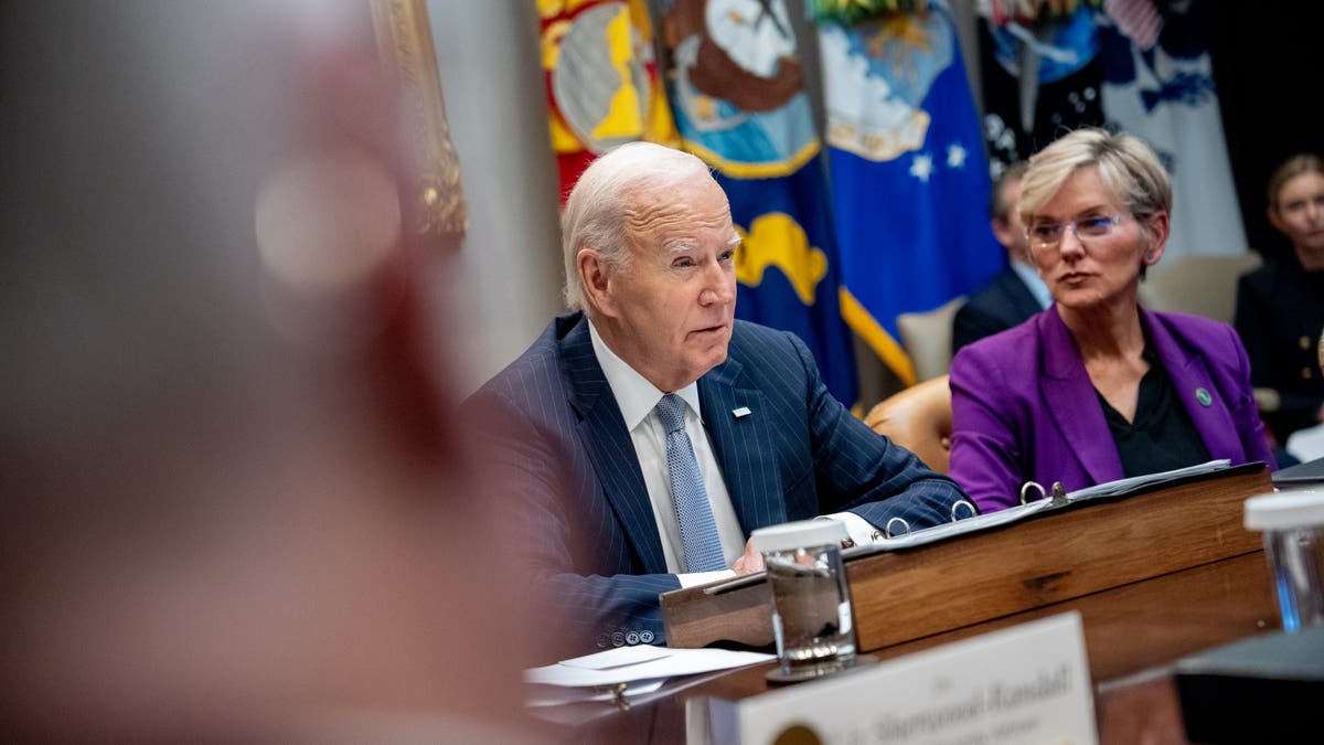 President Biden, accompanied by Energy Secretary Jennifer Granholm (R), gives an update on the government's response to Hurricanes Milton and Helene in the Roosevelt Room of the White House on October 11, 2024, in Washington, D.C.