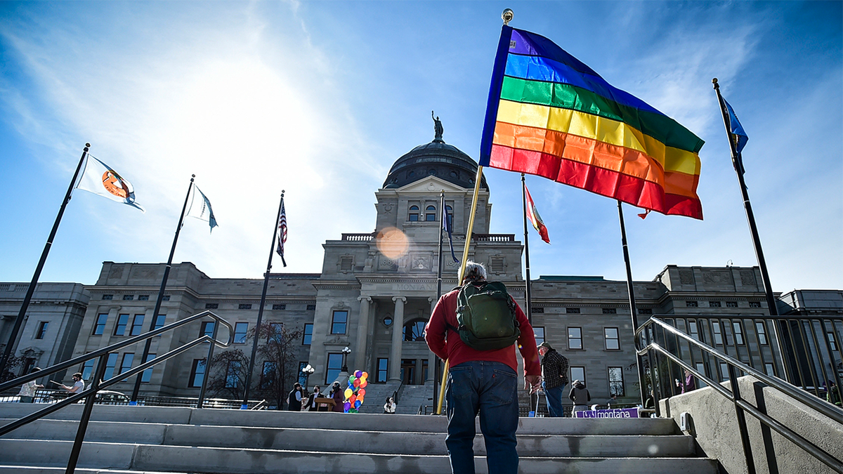 Demonstrators gather on the steps of the Montana State Capitol