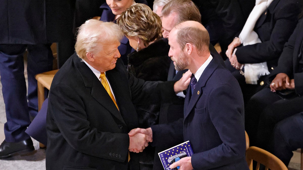 Trump shaking hands with Prince William