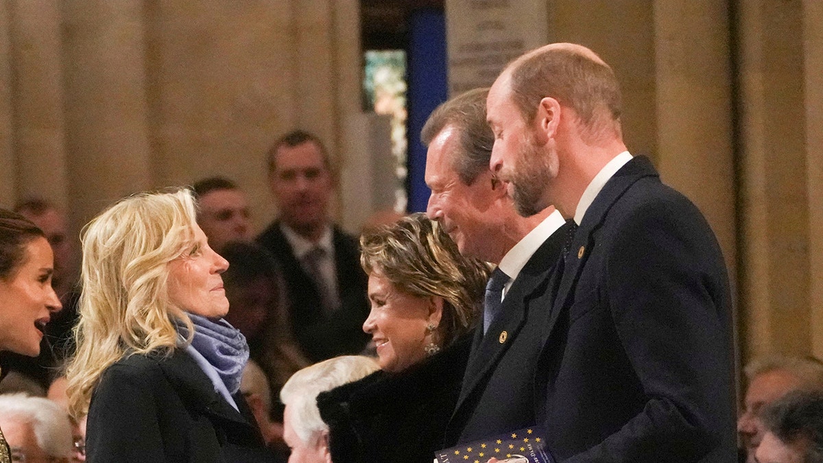 William shaking hands with Jill Biden