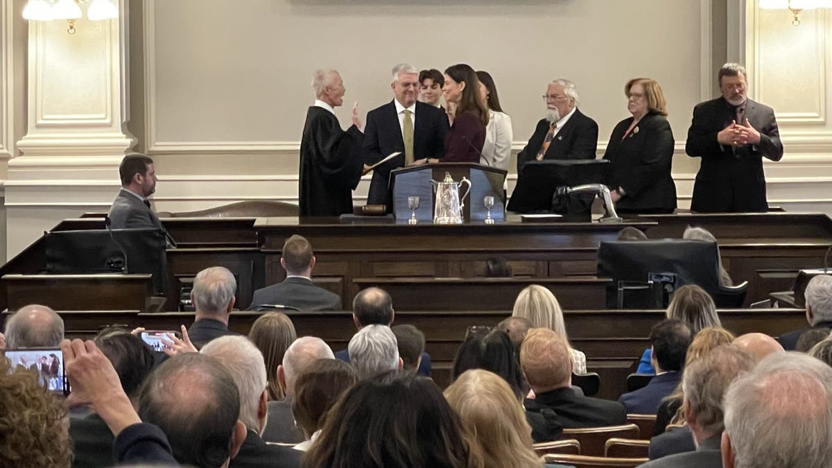 New Hampshire Gov. Kelly Ayotte is sworn in in Concord. 