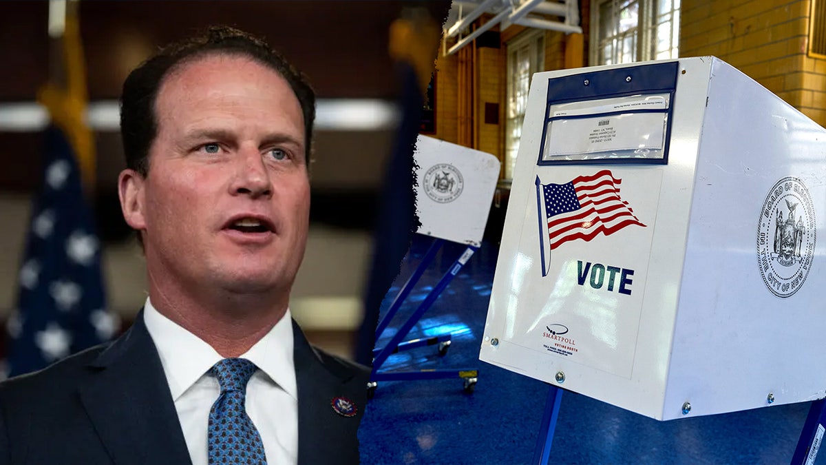 Rep. August Pfluger of Texas next to a voting booth