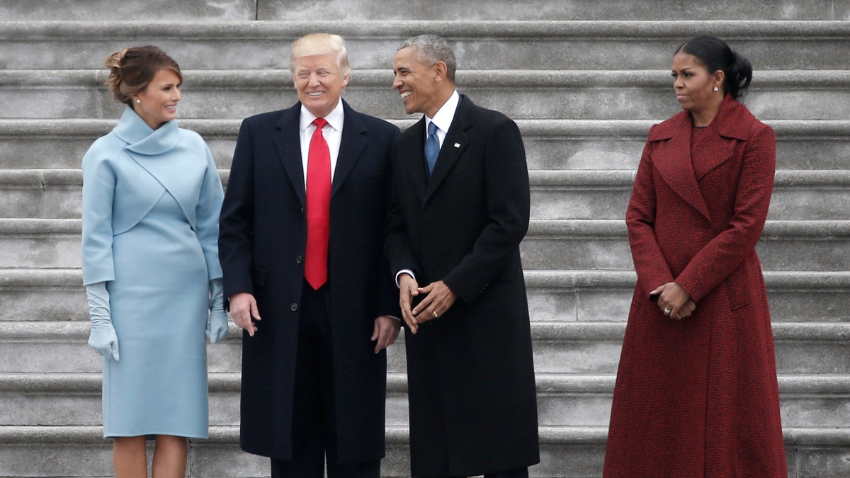 Former President Barack Obama and first lady Michelle Obama are pictured with President Trump and first lady Melania Trump on the steps of the U.S. Capitol