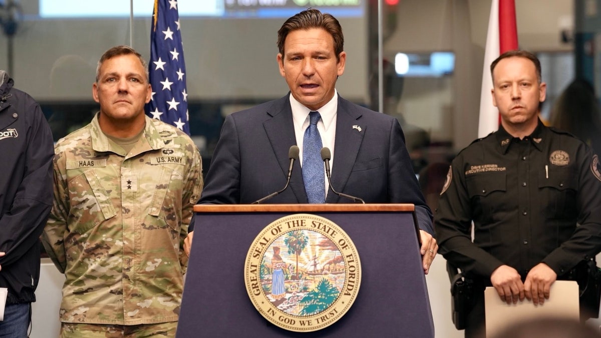 Ron DeSantis behind a podium