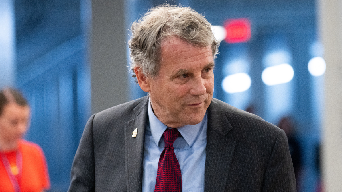 Sherrod Brown, D-Ohio, walks through the Capitol in July.