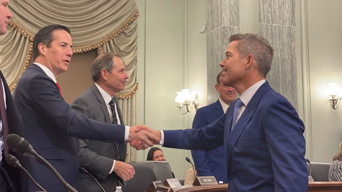 Sean Duffy shaking senators hands 