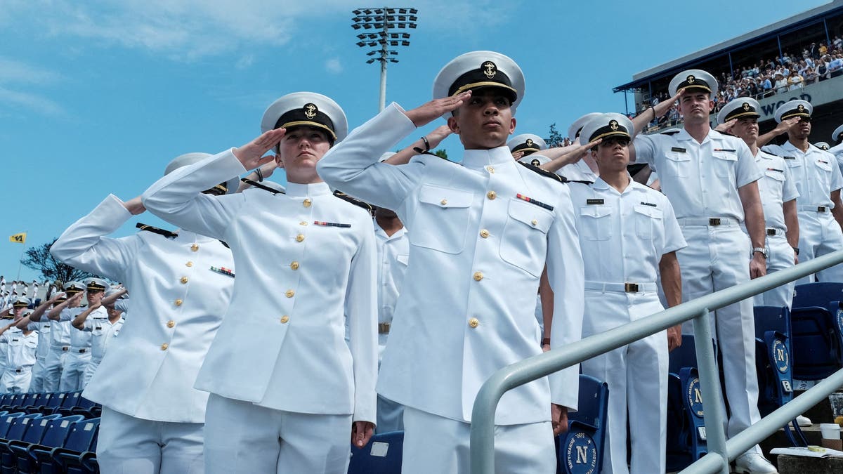 Midshipmen salute