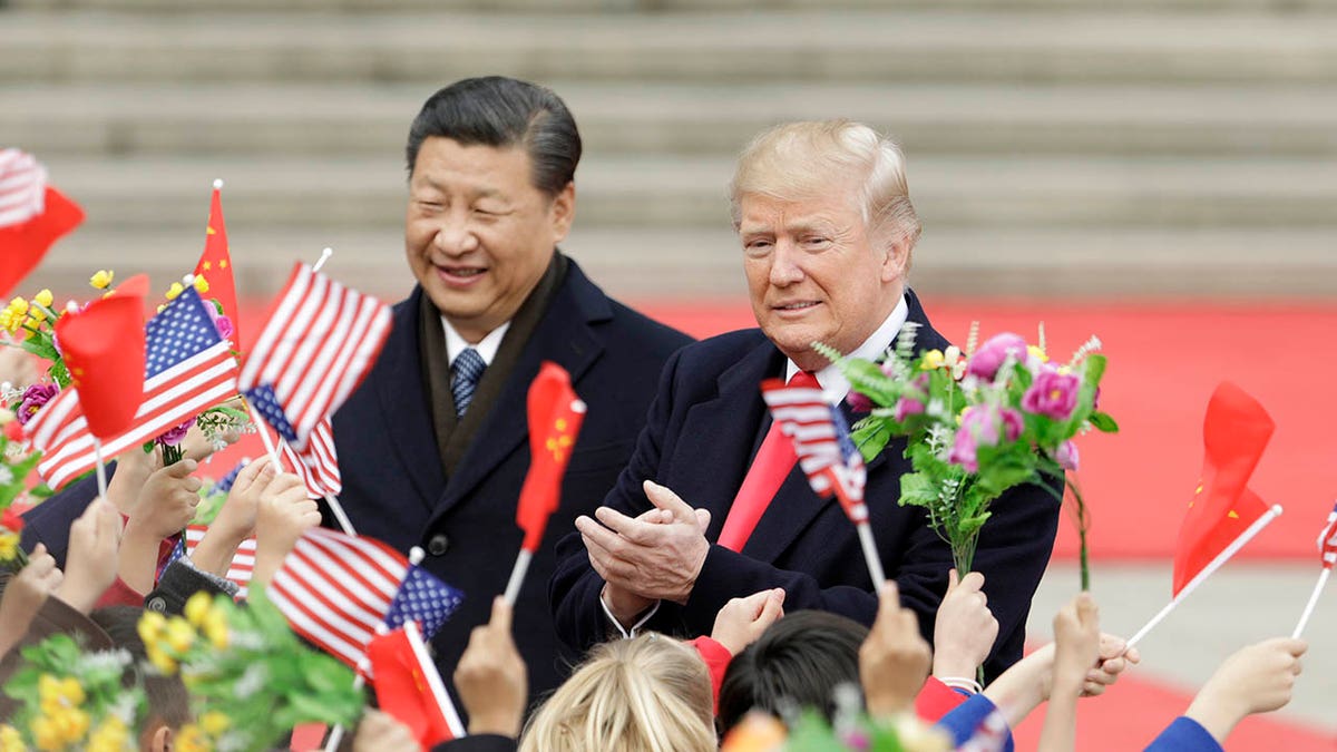 Trump with Xi in Beijing